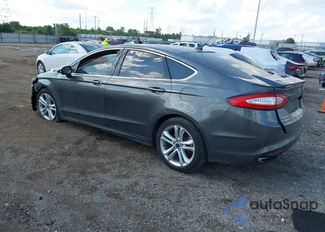 2016 Ford Fusion Titanium z USA, uszkodzony, nr VIN 3FA6P0K98GR300354